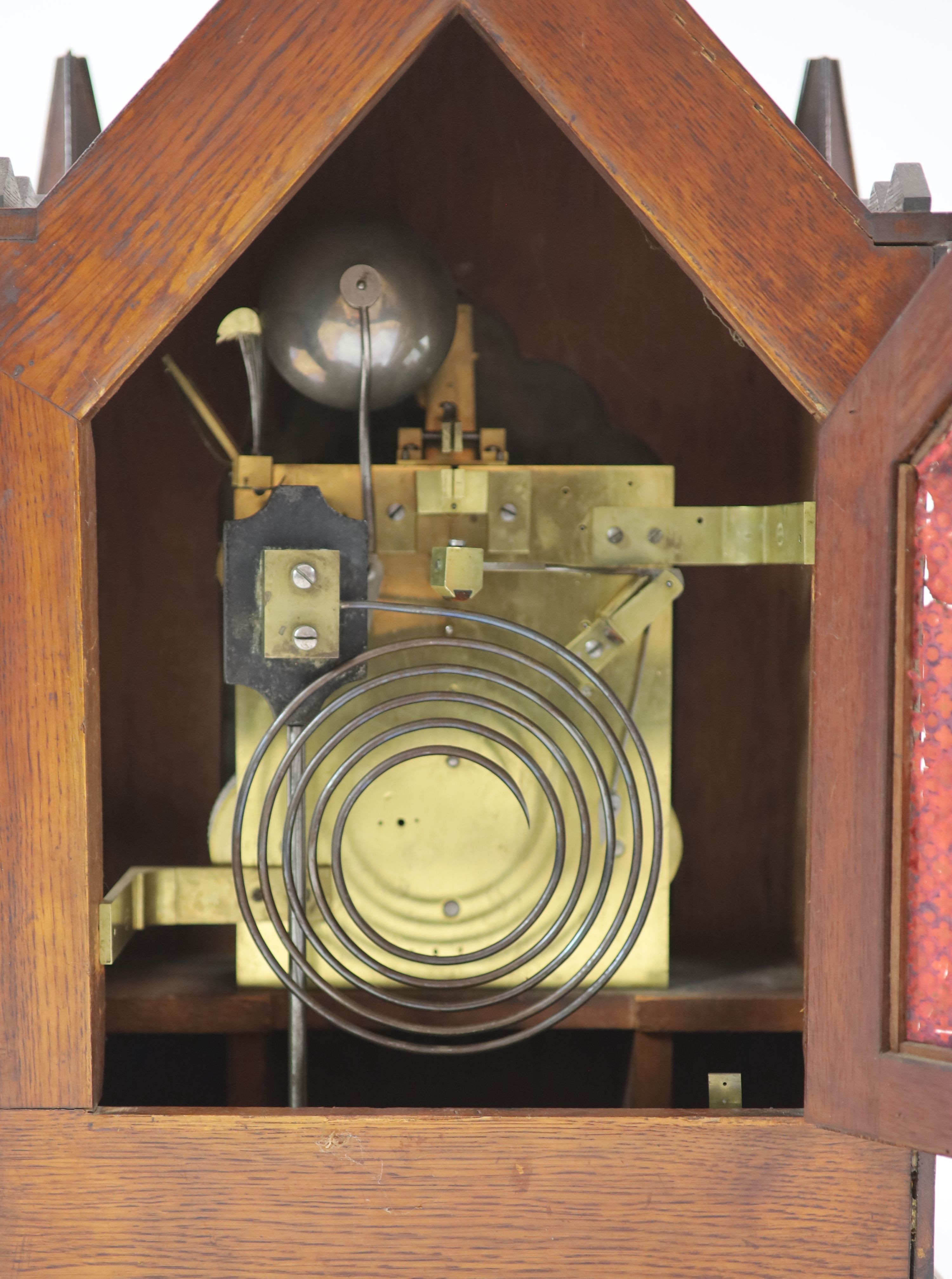 A Victorian golden oak Gothic design chiming bracket clock by Gillett & Bland, Steam Clock Factory, Croyden H 74cm. W 48cm. D 31cm.